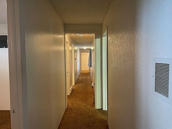 Hallway to bedrooms & baths 