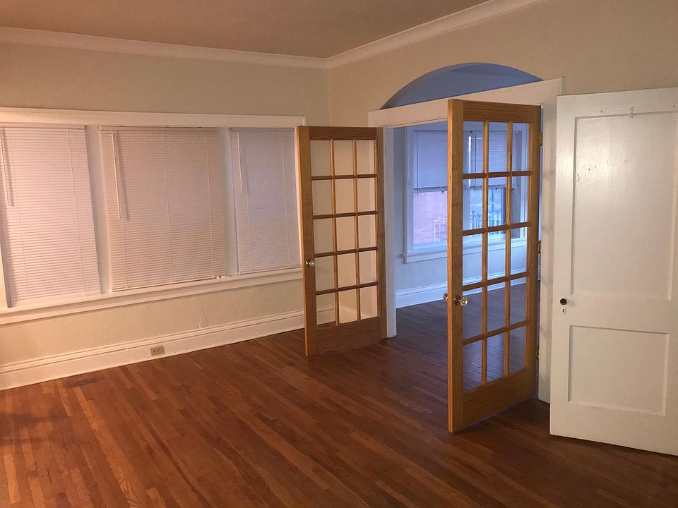 French doors from living room to front bedroom