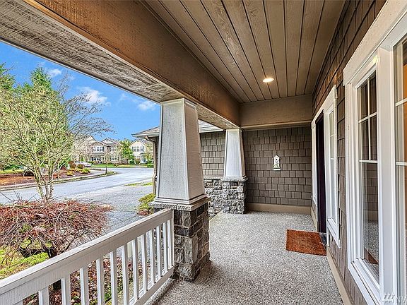Beautiful extra wide covered front porch.