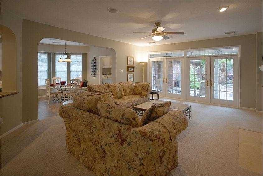 Large family room with French doors to patio.