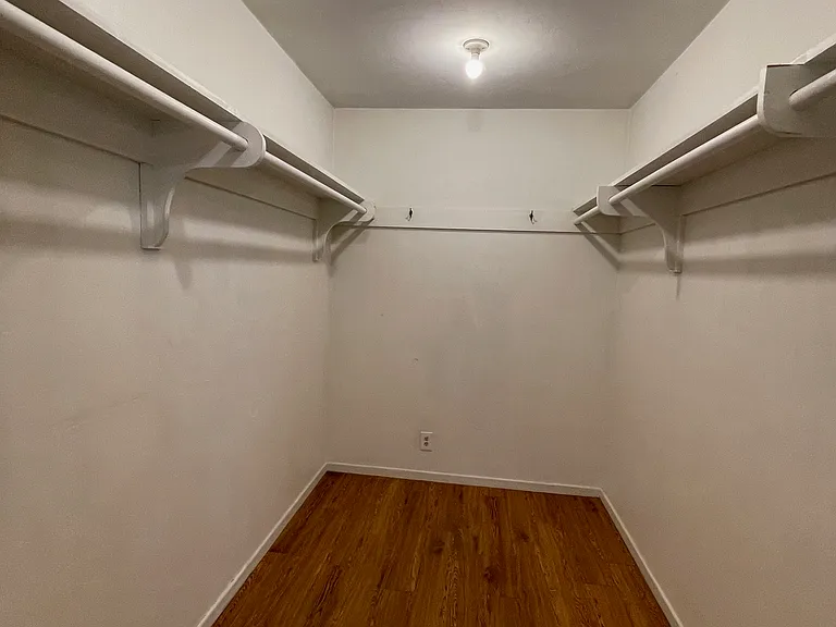 main bedroom walk in closet