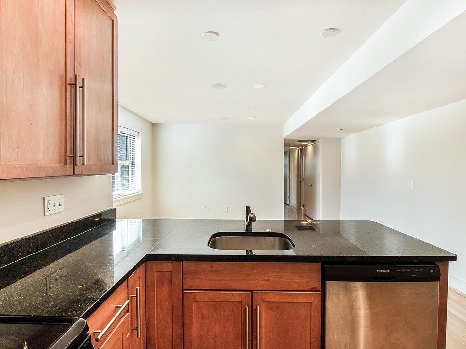 Kitchen looking into den