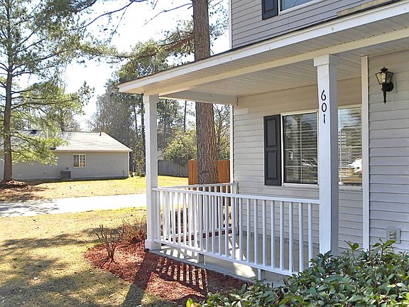 Full Front Porch. Front yard offers a 3 Zone Irrigation System.