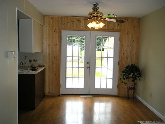 French doors in dining room lead to outside patio