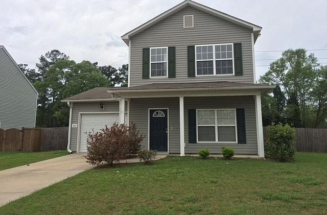 Photo of front of 109 farm quarters