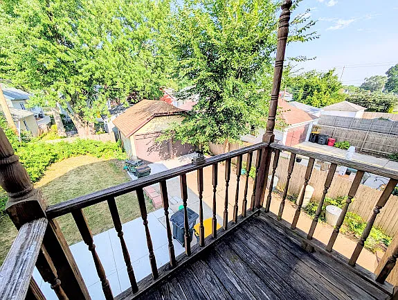[UPPER UNIT]: second balcony, facing backyard (east)