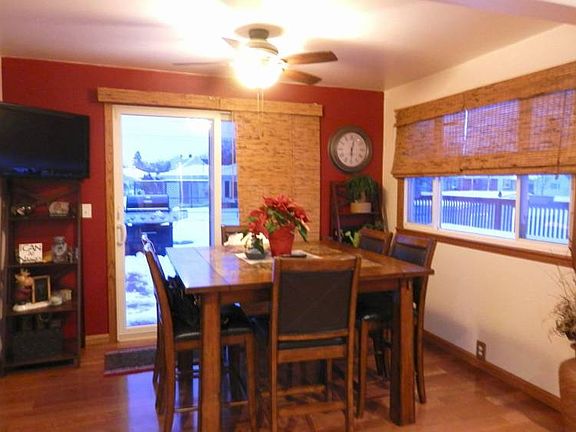 Spacious dining area overlooks back yard