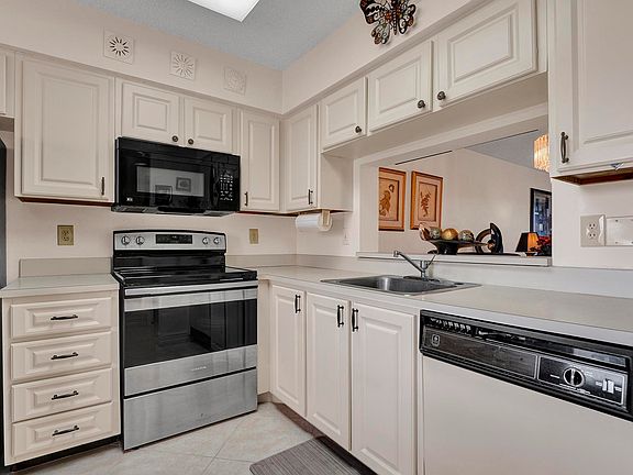3rd image of 7320 Amberly Lane #305