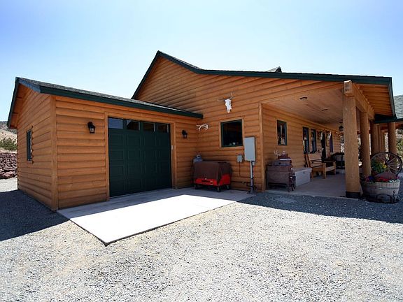 Lovely custom built cabin with wrap around porch and 360 views!