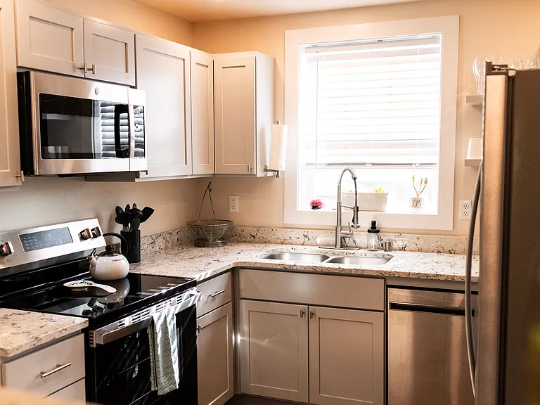 Includes dishes, silverware, and cooking utensils.