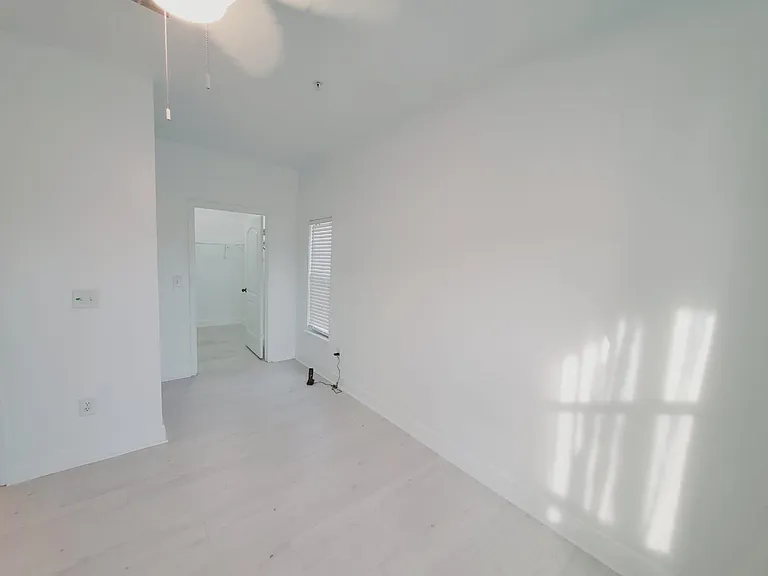 2nd bedroom with office size closet. lake view from the window