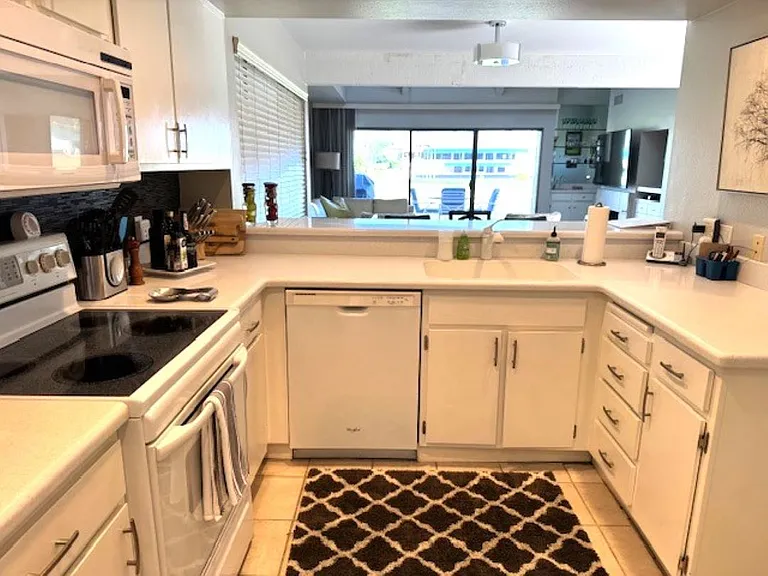 Kitchen looking out into living area.