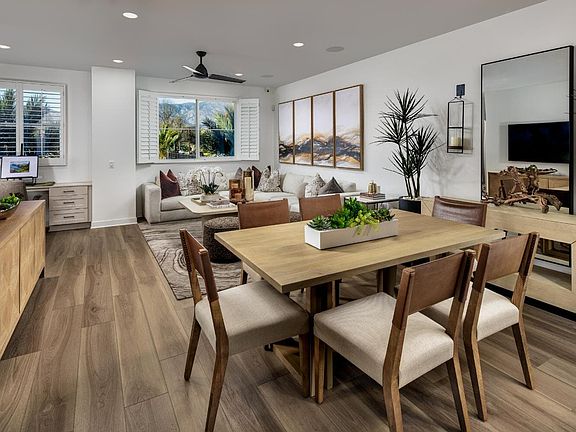 An image of the Dining and Great Room in the Plan 6 model home at Magnolia.