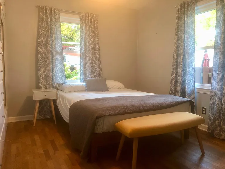 Bedroom #2 furnished (available). Queen bed as reference room size.