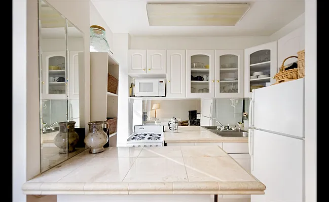 Sold by Douglas Elliman | media 18