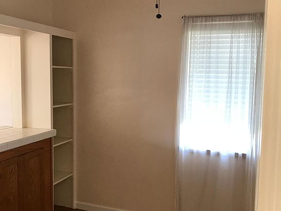 Dining room with opening to look through to Living room