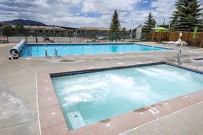 Awesome pool with lap area and two large hot tubs open and heated year round.