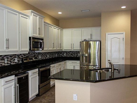 4th image of 9748 Troncais Cir
