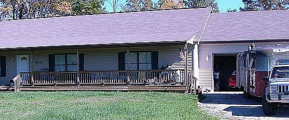 Front With 3 Car Garage