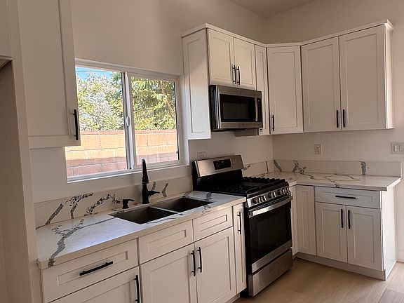 2nd image of 8900 Omelveny Ave