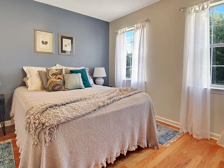 Guest room with new queen bed and mattress