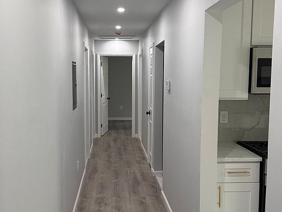 Main Hallway headed toward rooms and kitchen