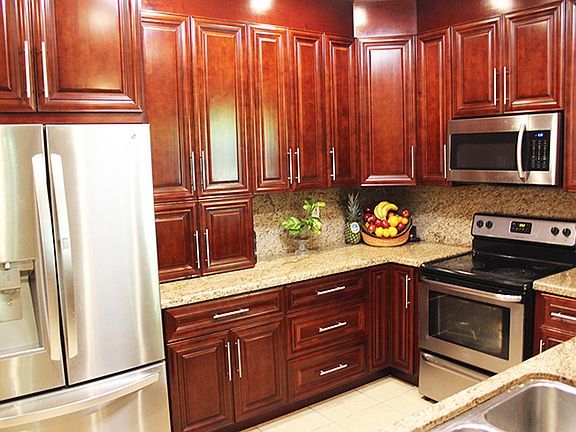 Kitchen 
Hard wood cabinets