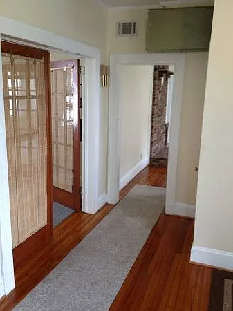 Hallway leading up to living area