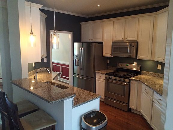 Kitchen with granite countertops, new stainless steel applia