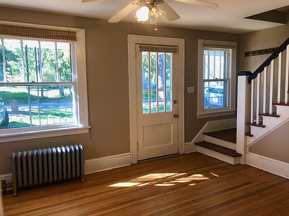 Living room has large windows.