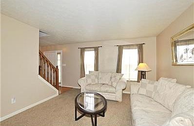 Formal living room with newer carpet and fresh paint