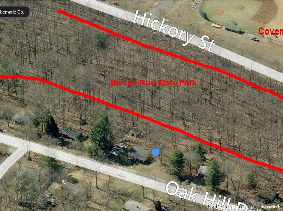 Aerial view showing park behind house