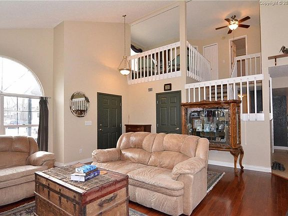 Beautiful, bright entrance. Open to dining, kitchen and loft.