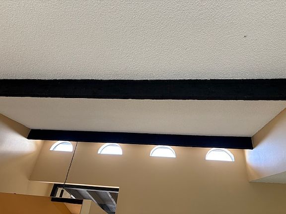 Windows of vaulted ceiling in Living area of Great Room