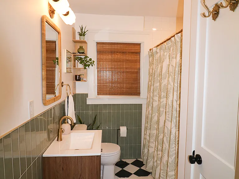 Brand new (2025) fully remodeled bathroom features timeless tile, linen closet with towels included, and modern fixtures