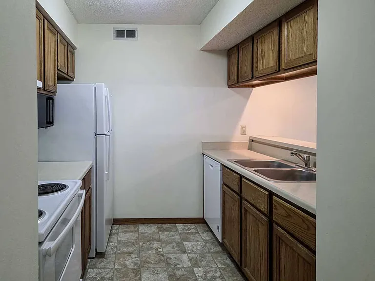 Ample counter space and cabinets provide room for everything you need.
