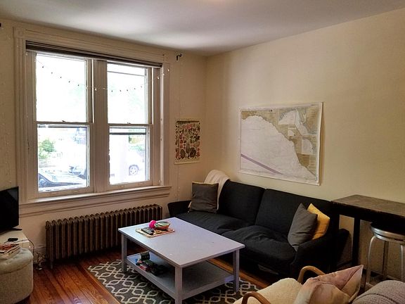 Living room, looking toward the front porch (furniture not included)