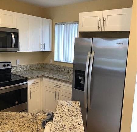 2nd image of 8710 N Sherman Cir APT 103
