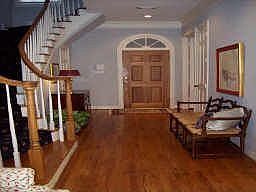 Spacious entry with hardwood floors welcome you into this beautiful home. Half bath with designer wa