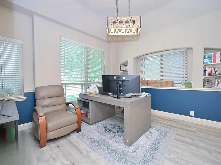 Office with double door entry and front view
