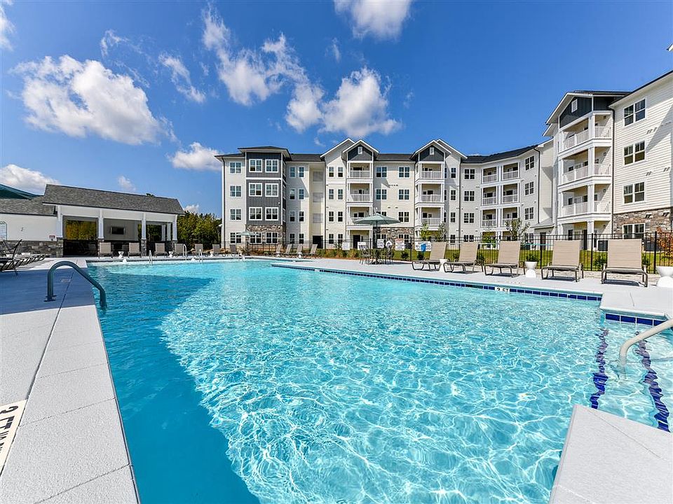 Sparkling swimming pool with sundeck