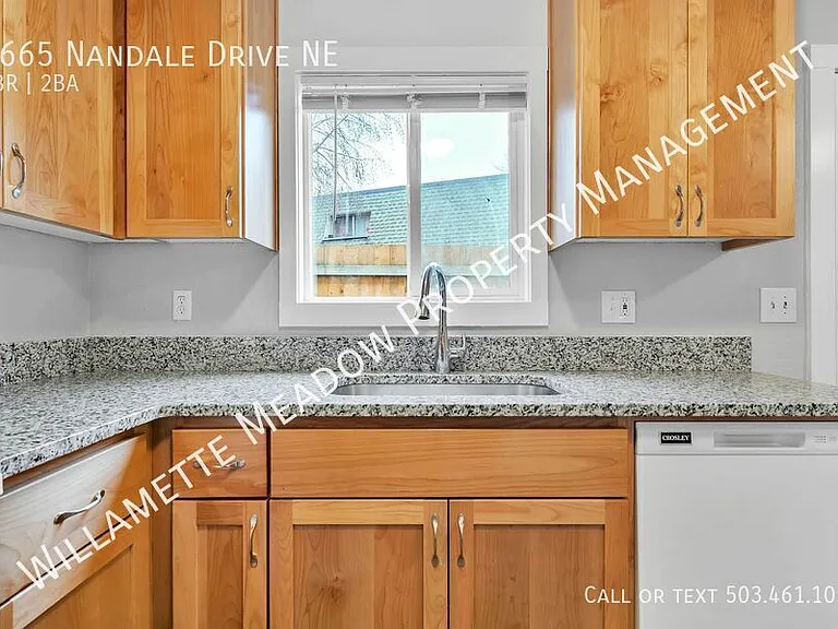 4665 Nandale Dr NE — Photo 3