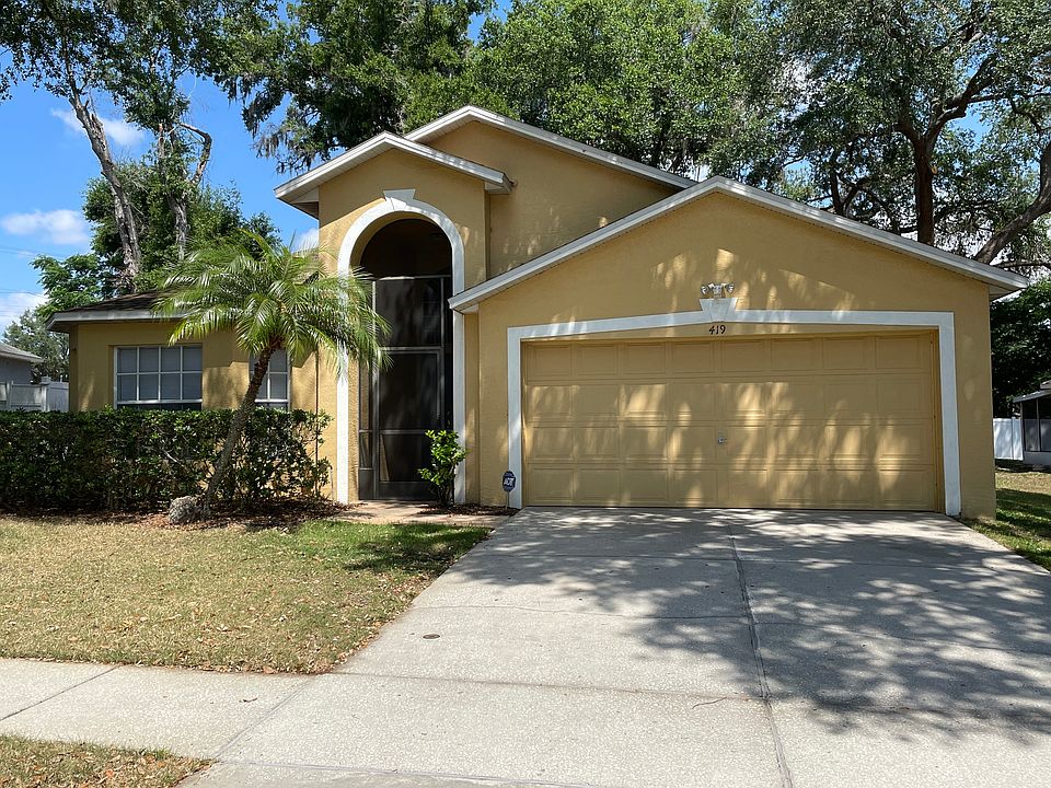 Beautiful home with cathedral ceililngs, screened porch, 4 bedrooms, 3 bathrooms, and 2 car garage