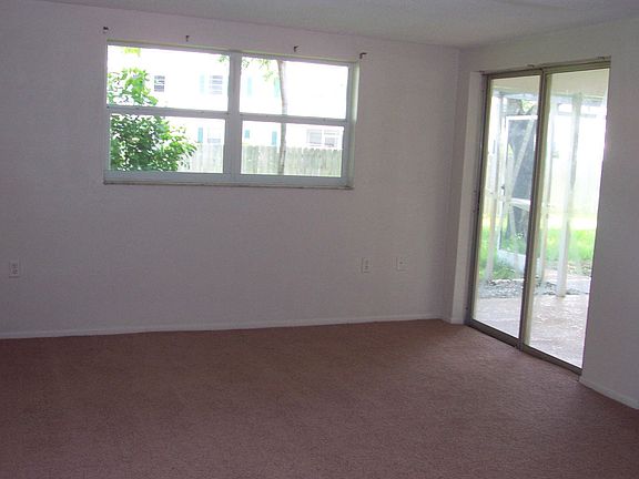 Master Bedroom w/ slides to porch