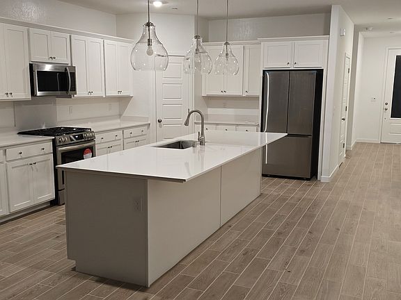 Kitchen with stainless steel appliances