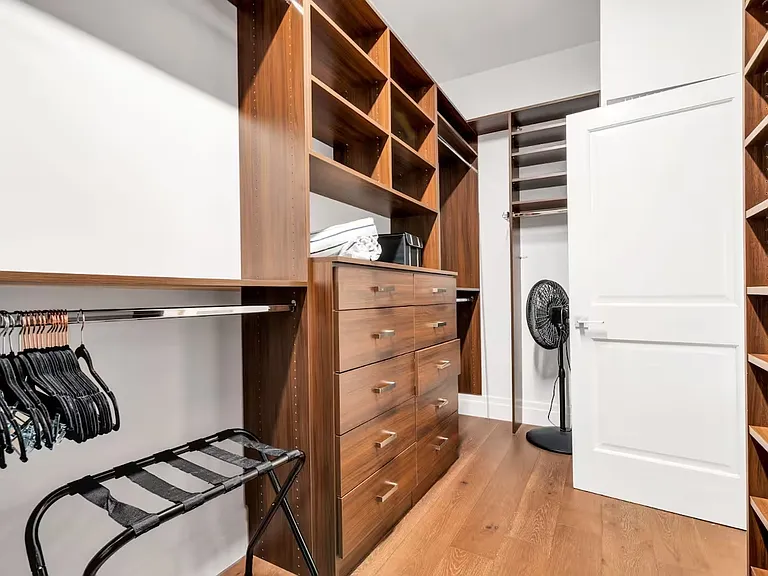 Large primary walk-in closet.