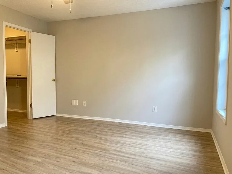 Bedroom with walk-in closet