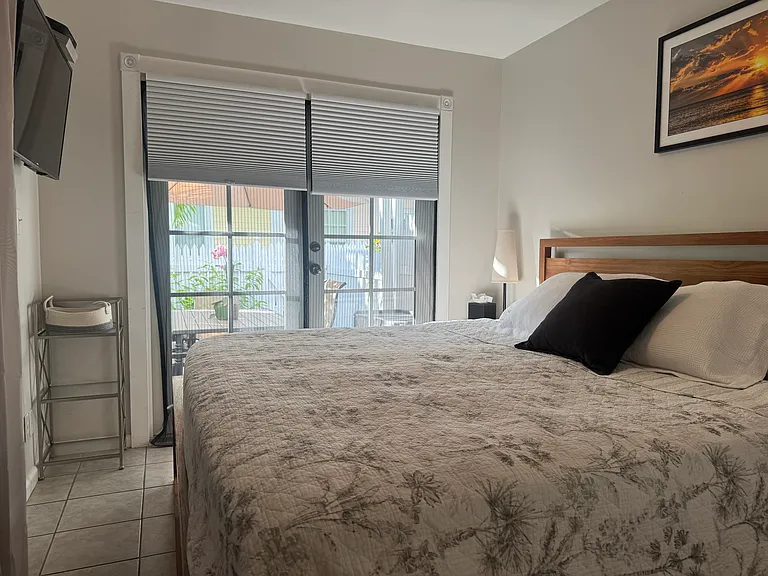 King size bed (master) access to patio through french door