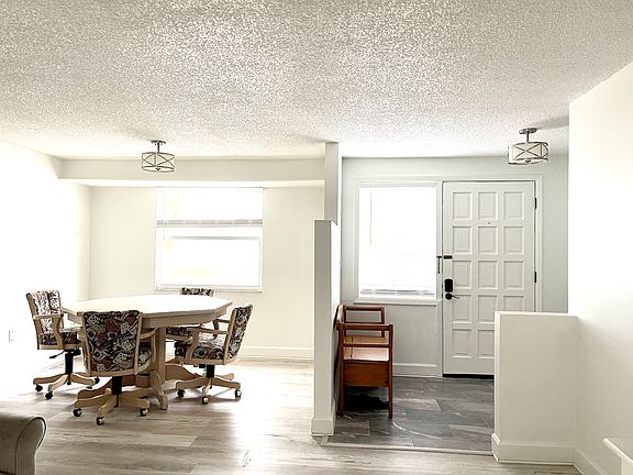 game area or reading area off of entrance/living room