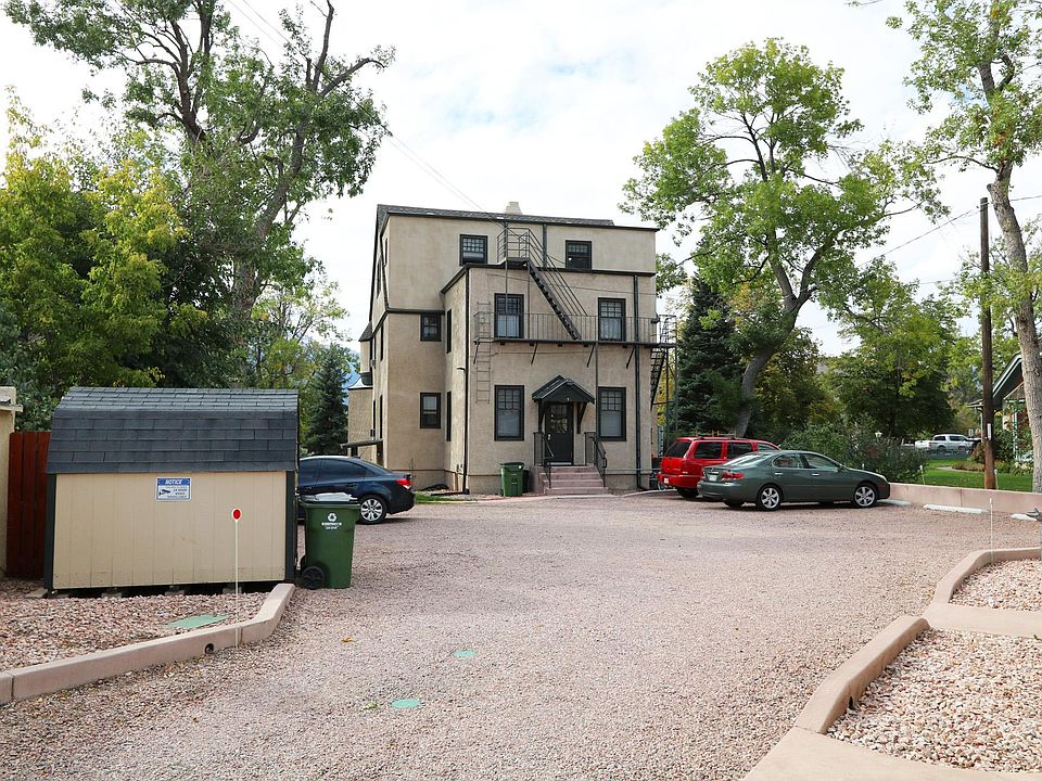Parking area and rear of building with secured entrance